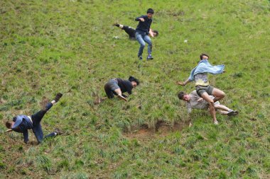 The traditional cheese rolling races in Brockworth, UK.