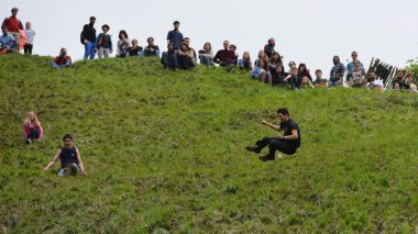 The traditional cheese rolling races in Brockworth, UK.