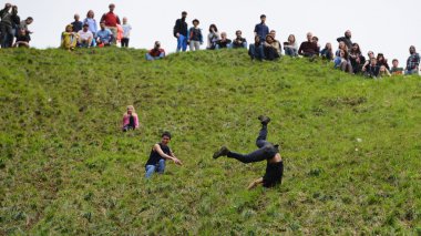 The traditional cheese rolling races in Brockworth, UK.
