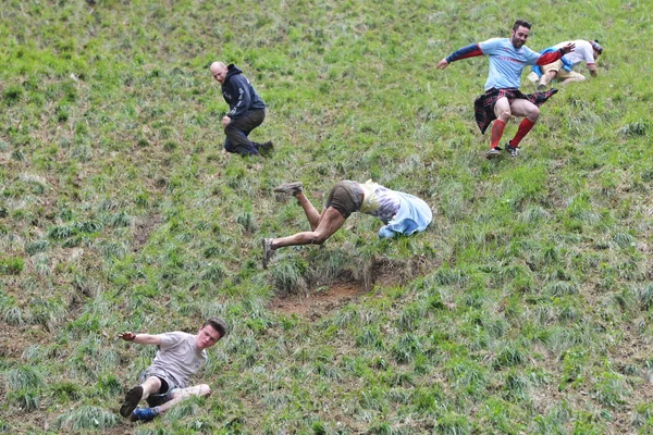 The traditional cheese rolling races in Brockworth, UK. — Stock fotografie