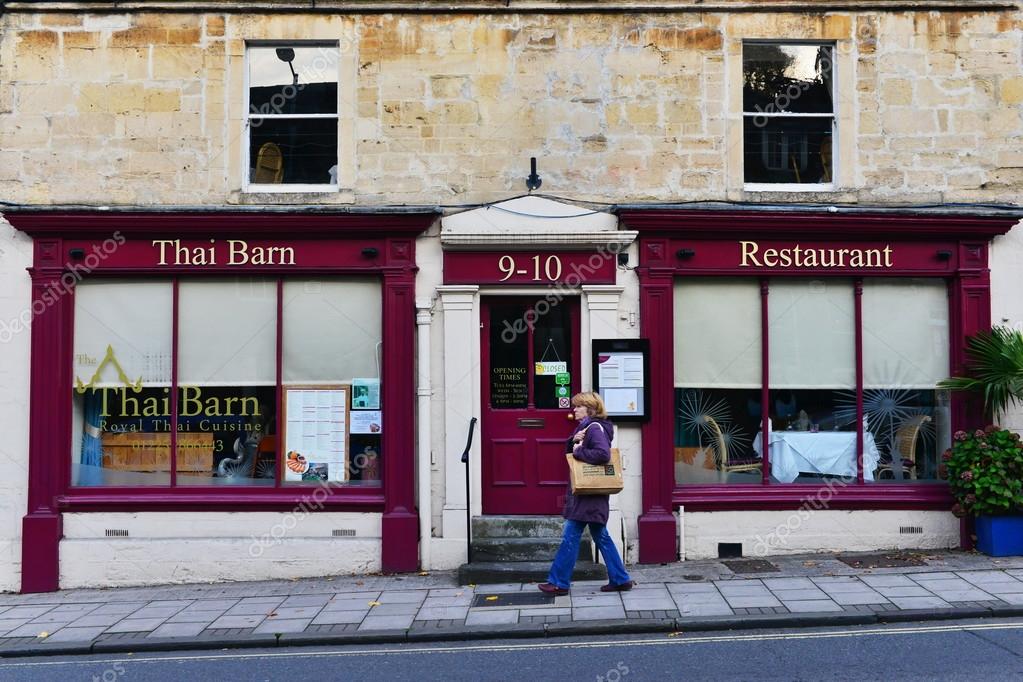 View Of A Thai Restaurant On A Town Centre Street Stock