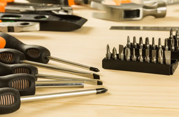 Screwdriver set on wood table — Stock Photo, Image