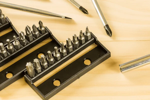 Screwdriver set on wood table — Stock Photo, Image