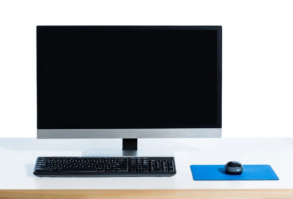 Desktop computer with screen glare isolated on white — Stock Photo, Image