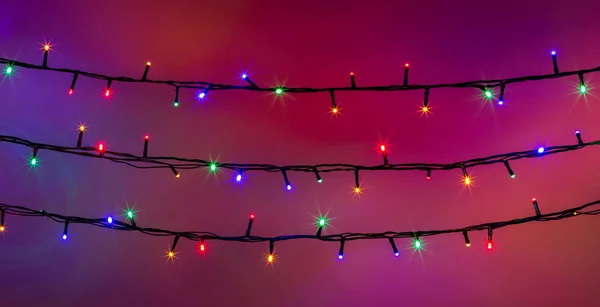 Leuchtende bunte Weihnachtslichter — Stockfoto