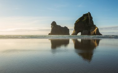 Rocky Islands at Wharariki Beach clipart