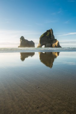 Rocky Islands at Wharariki Beach clipart