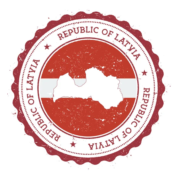 状態の色のヴィンテージゴムスタンプでラトビアの地図と旗. — ストックベクタ