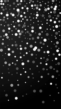 Beyaz noktalar Noel arkaplanı. İnce uçan kar taneleri ve siyah arka plandaki yıldızlar. Temyize giden Gümüş Kar Tanesi şablonu. Değerli dikey illüstrasyon.