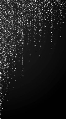 Muhteşem düşen yıldızlar Noel arkaplanı. İnce uçan kar taneleri ve siyah arka plandaki yıldızlar. Canlı canlı gümüş kar tanesi şablonu. Büyük dikey illüstrasyon.