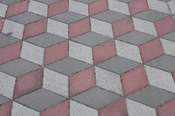 Textura de azulejos de pavimento rojo y gris. Para el fondo . — Foto de Stock