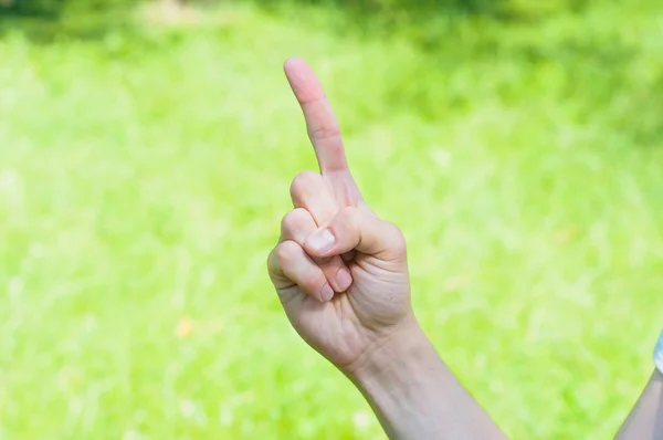 Signo o símbolo número uno (un dedo ) — Foto de Stock