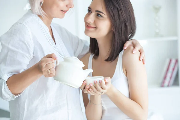 Mother Daughter Drinking Tea Indoors — Stock Photo, Image