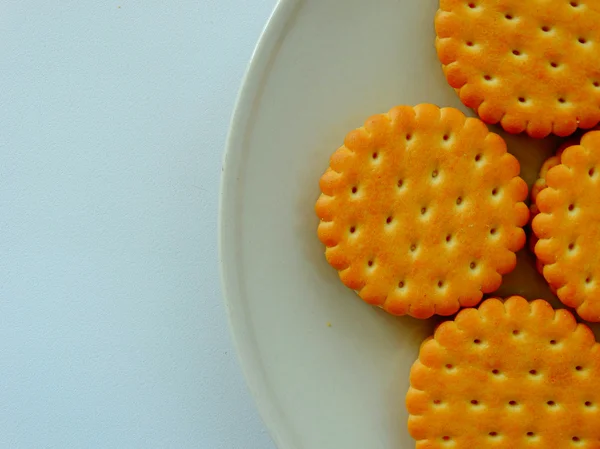 Biscoitos saborosos em um prato — Fotografia de Stock