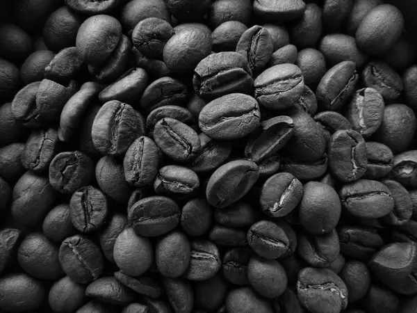 Grãos de café em uma panela — Fotografia de Stock