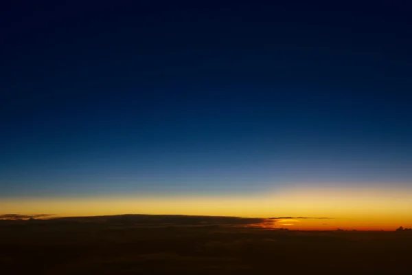 Pôr do sol vista do avião — Fotografia de Stock
