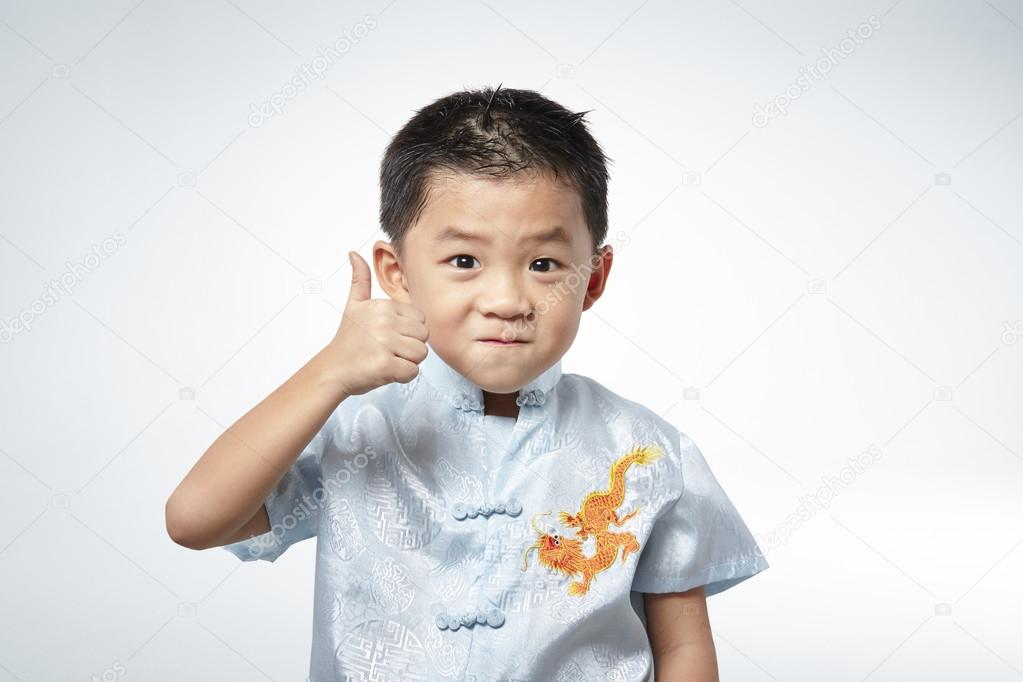 boy showing thumb up