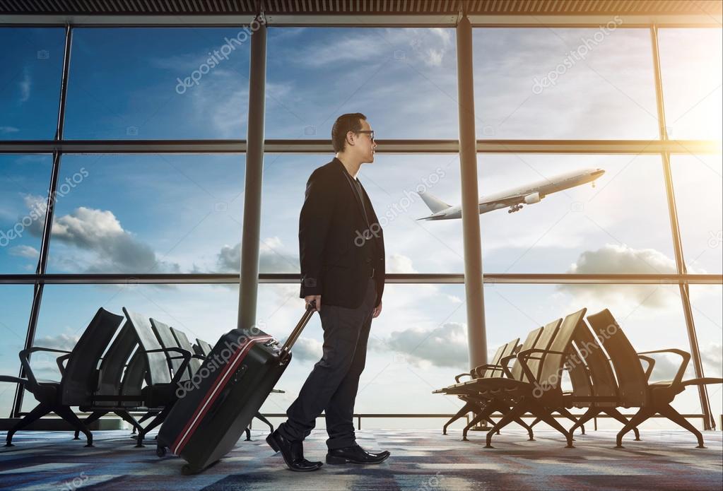 Businessman at airport during trip