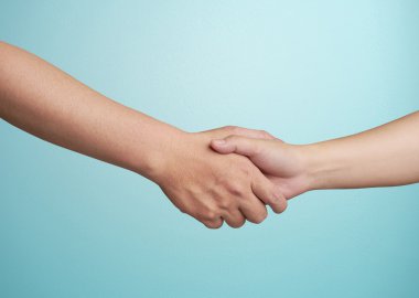 Two human hands touching