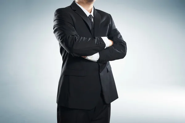 Businessman with side folded arms — Stock Photo, Image