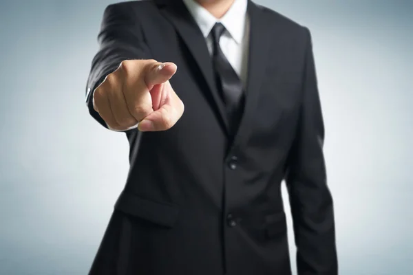 Business man points finger — Stock Photo, Image
