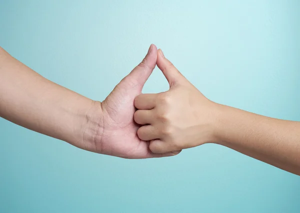 Duas mãos humanas tocando — Fotografia de Stock