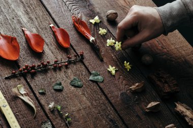 Man arranging flowers 