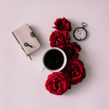 Coffee cup with roses, white book  clipart