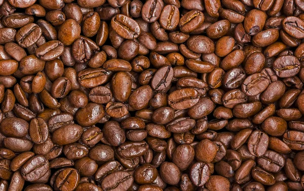 Imagen de fondo de granos de café tostados . — Foto de Stock