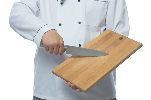 Cook ukazuje desky a nůž v rukou — Stock fotografie