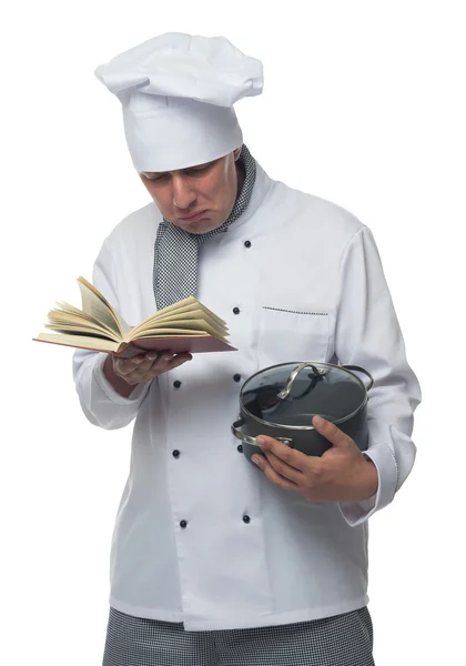 Chef segurando um livro e um pote nas mãos de — Fotografia de Stock