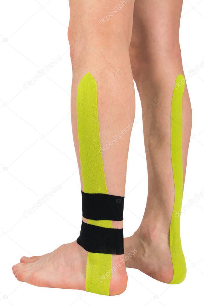 injured lower part of two legs with applied medical tape to help relieve pain, isolated on white, side view