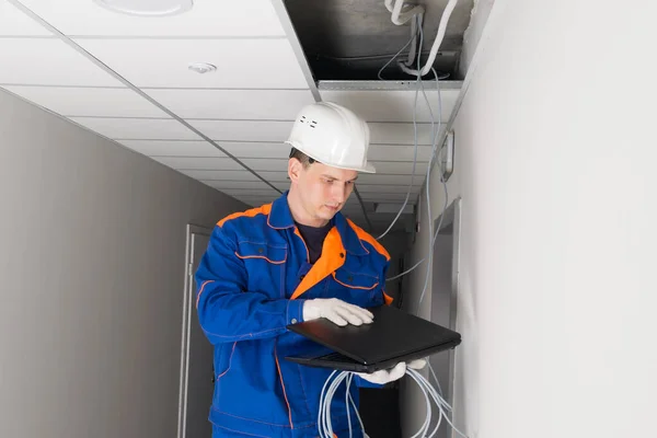 a worker configures a secure Internet in the building