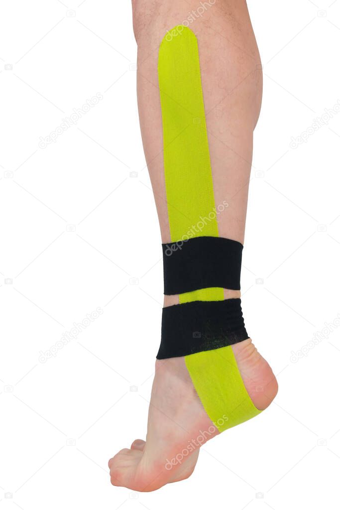 on the ankle of the leg, a fixing tape is pasted, for pain in the joints and muscles