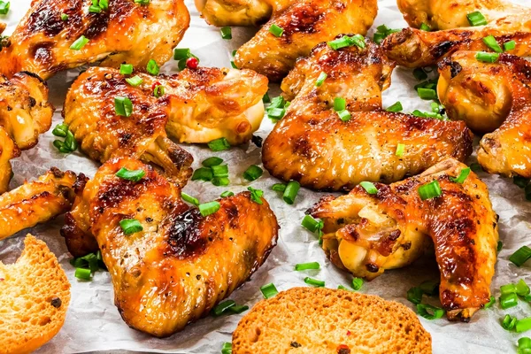 Roasted chicken wings with spices,  top view, close-up — ストック写真