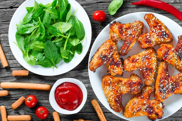 Roasted chicken wings with spices,  top view, close-up — Stockfoto