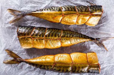 Smoked fish Mackerel or Scombe, top view clipart