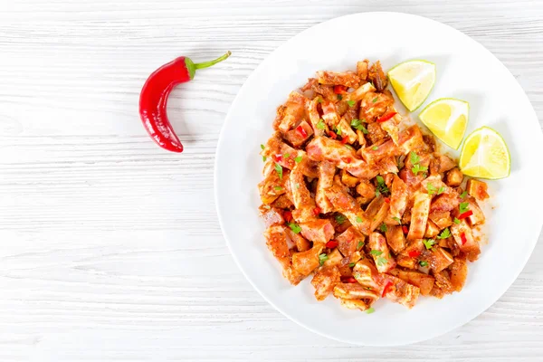 Braised Pig Ears  pieces of lime sprinkled with parsley — Stock Photo, Image