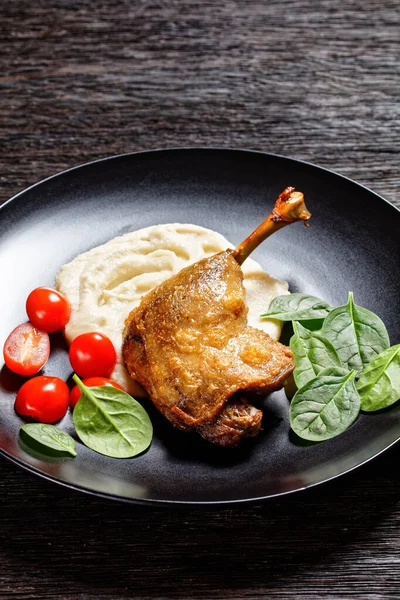 Duck Confit Parsnip Puree Orange Sauce Cherry Tomatoes Fresh Spinach — Stok Foto