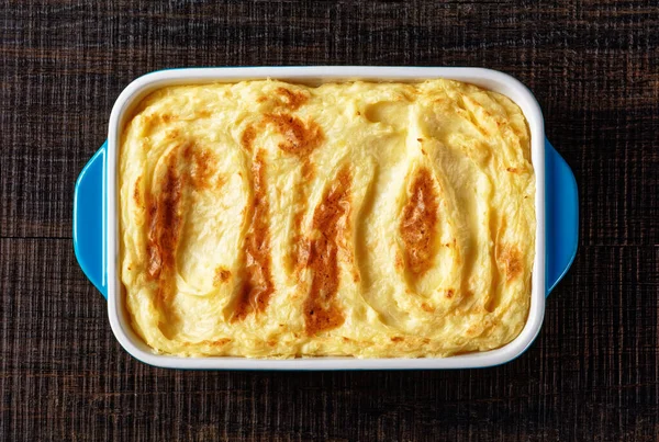 Baked Mashed Potatoes Parmesan Cheese Butter Baking Dish Dark Wooden — Fotografia de Stock