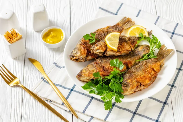 Fried Crucian Carps Golden Crispy Crust White Plate Parsley Lemon — Stock Photo, Image