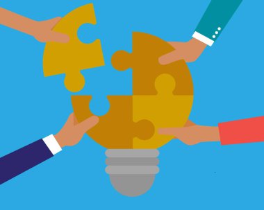 concept of creative teamwork with light bulb puzzle. teamwork each holding a puzzle piece shaped like a light bulb. innovative solutions and problem solving concept