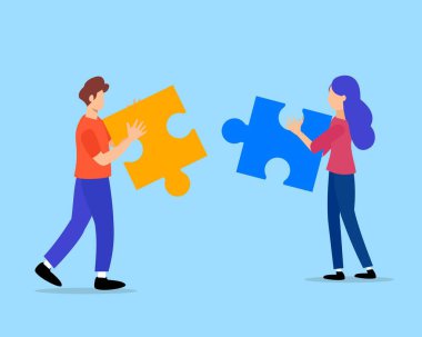 Yapboz parçalarını birbirine bağlayan bir çift. Sorun çözme için takım çalışması kavramı