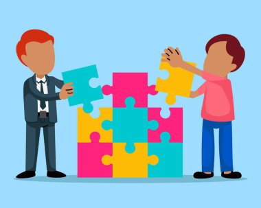 İnsanlar bulmacalar üzerinde çalışıyor. Sorun çözmek için takım çalışması. Çalışma ekibi bulmaca parçalarına katılıyor