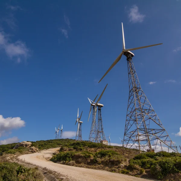 A range of windmills on the hill against the blue sky Royalty Free Stock Photos