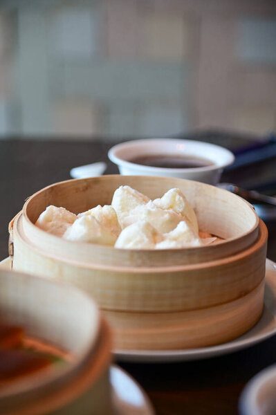 Close-up of Char Siu Bao, barbecue pork bun, BBQ pork bun. Traditional and common food in Yam Cha Culture. Chinese culture and Chinese cuisine. Food and beverage concept.