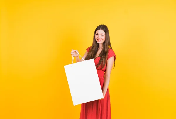 Woman  on yellow background — Stock Photo, Image