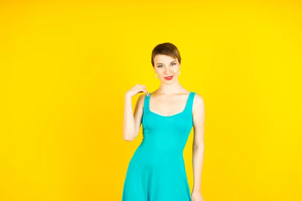 Woman on yellow background — Stock Photo, Image