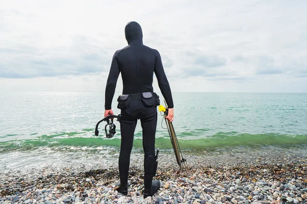 Underwater hunter on the beach — Stock Photo, Image