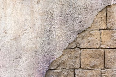 Arka plan ile bir tuğla duvar mastik kırdı